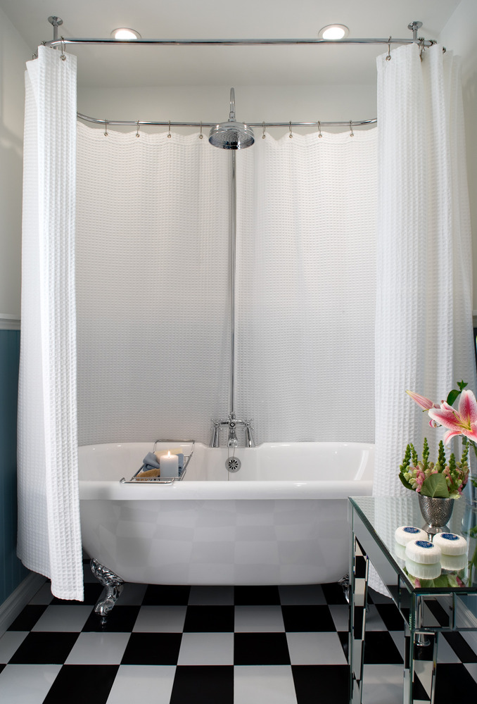 Freestanding Rolltop Bath With Shower Curtain On Circular Frame In